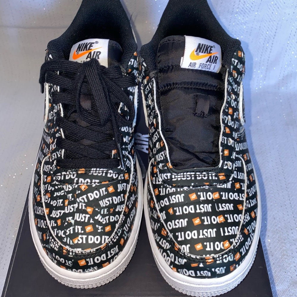 Black Nike Air Force 1s Just Do It logo